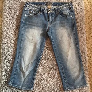 Low rise distressed Capri jeans